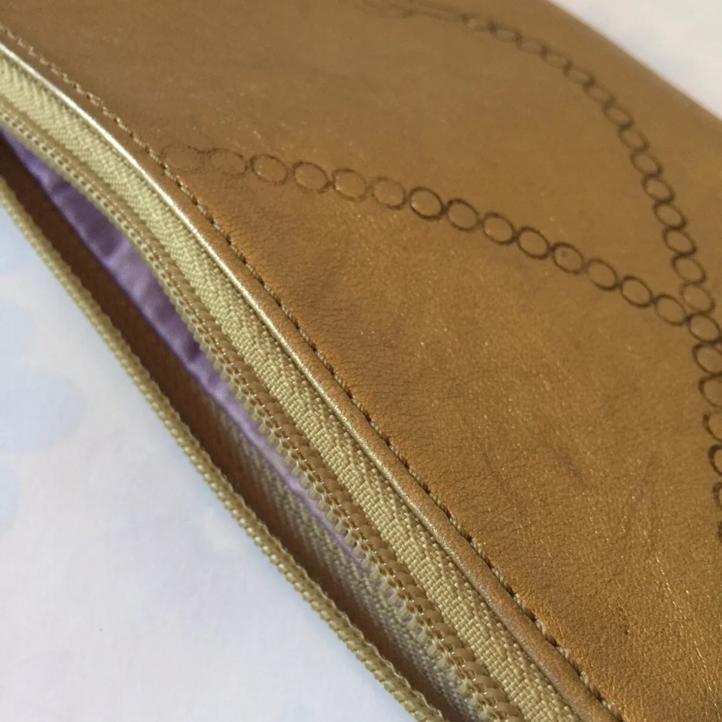 COACH Gold Leather Embossed Wristlet
