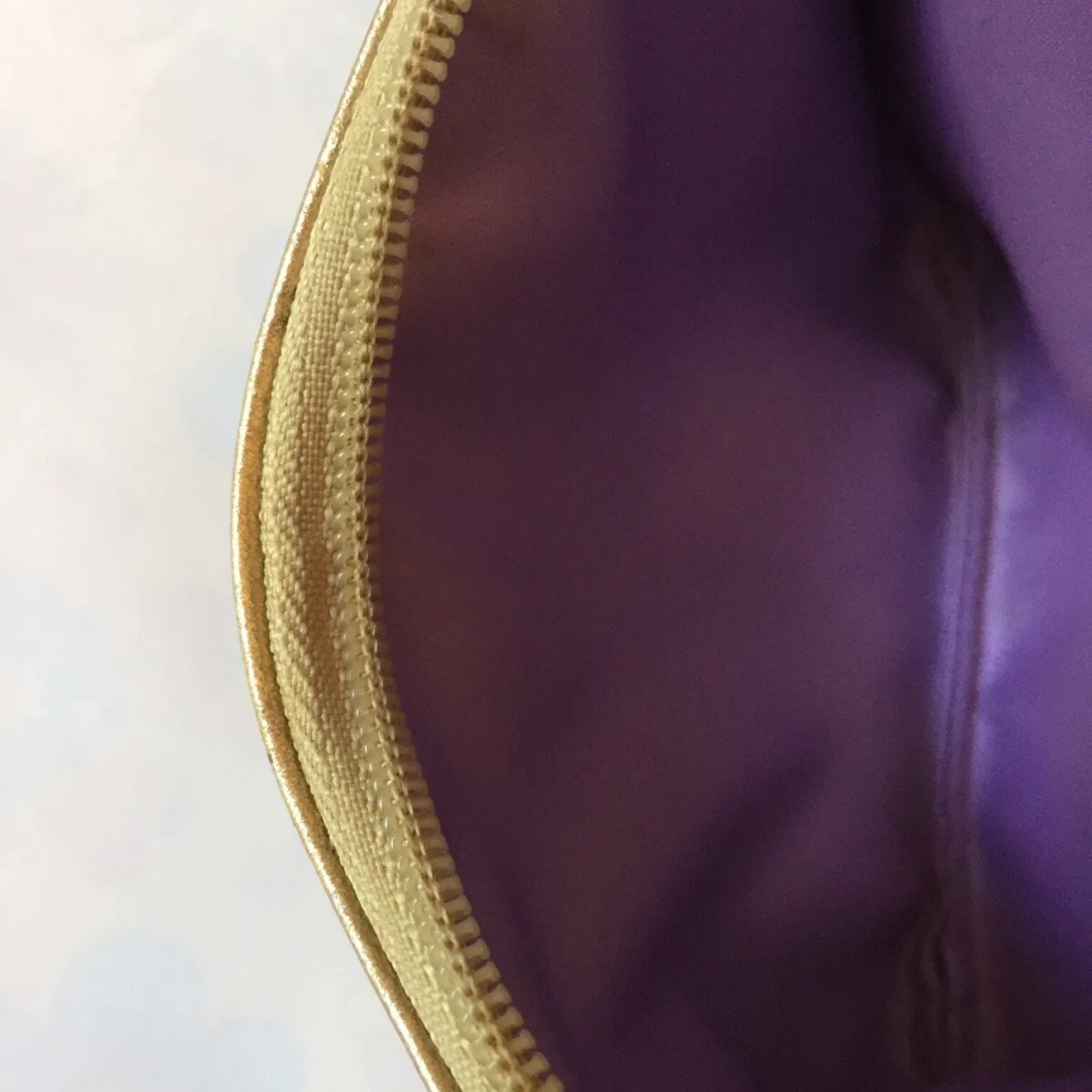 COACH Gold Leather Embossed Wristlet