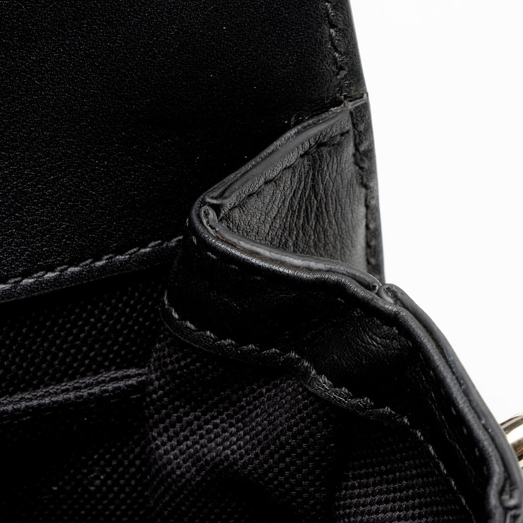 Gucci GG Canvas Gucci Go Bag
