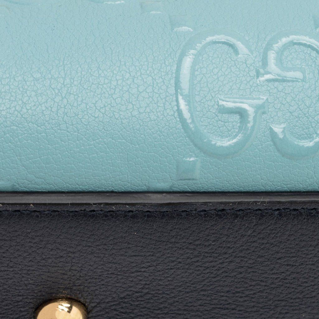 Gucci GG Debossed Leather Small Top Handle (SHF-ur1BGP)