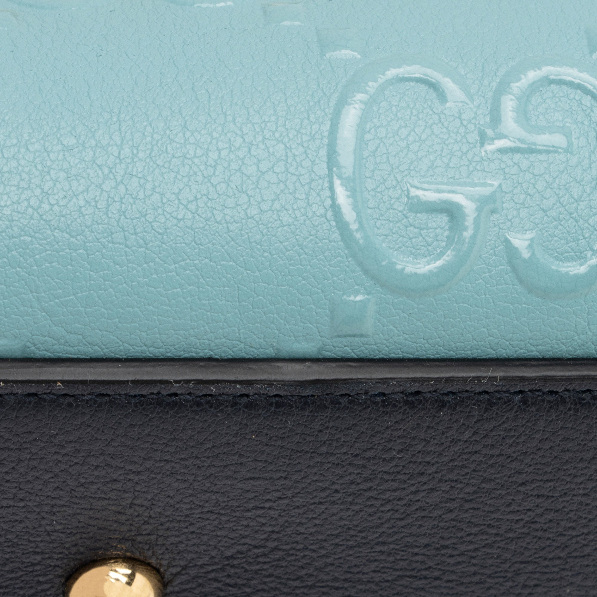 Gucci GG Debossed Leather Small Top Handle (SHF-ur1BGP)