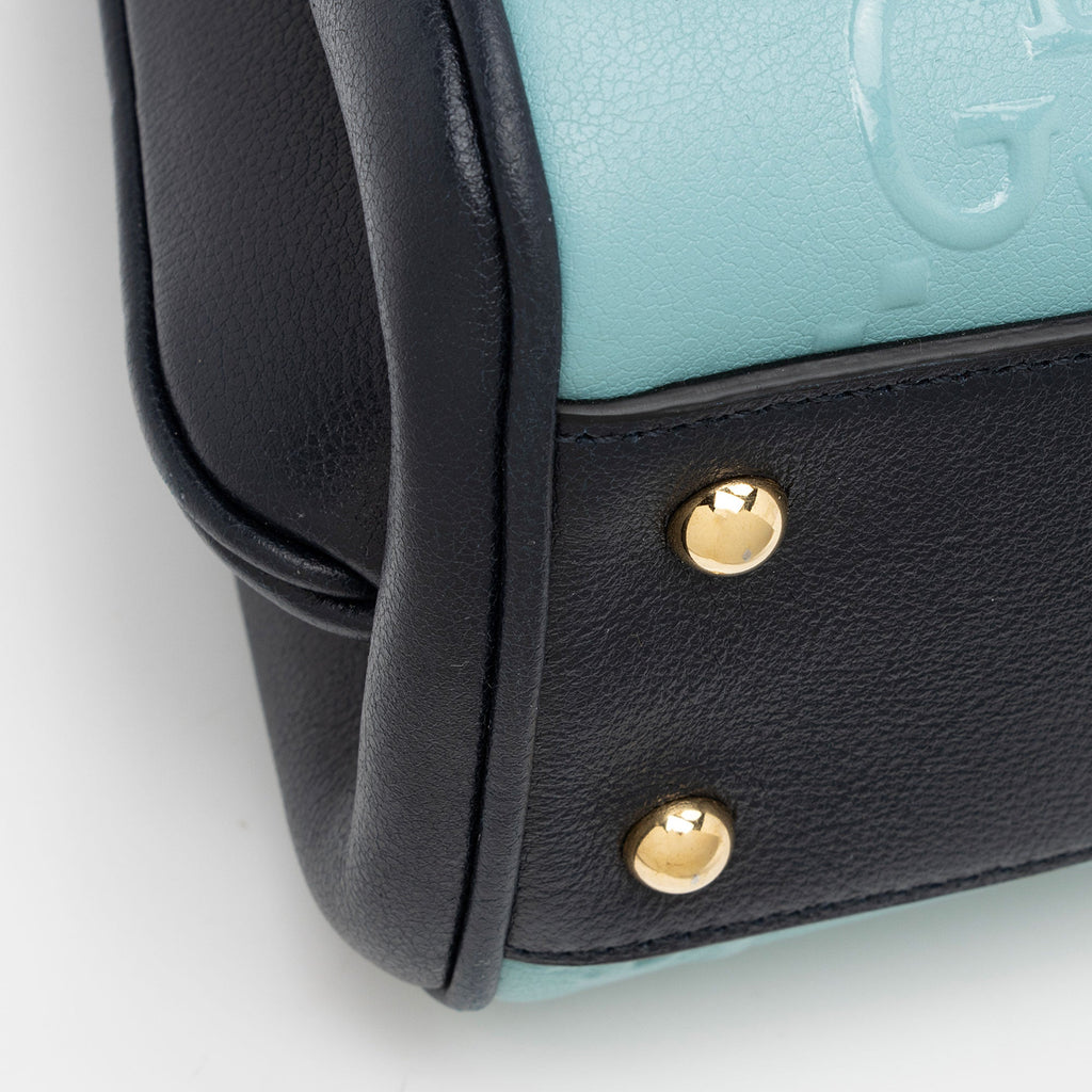 Gucci GG Debossed Leather Small Top Handle (SHF-ur1BGP)