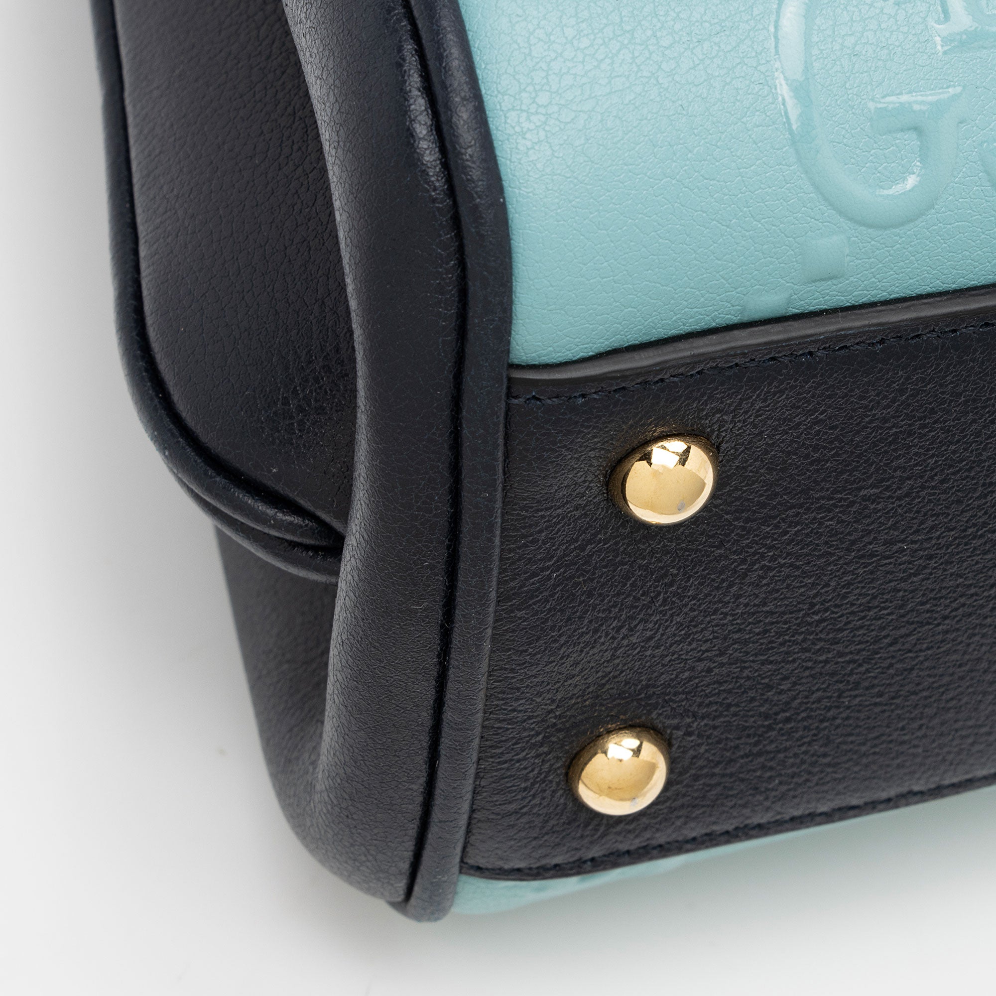 Gucci GG Debossed Leather Small Top Handle (SHF-ur1BGP)