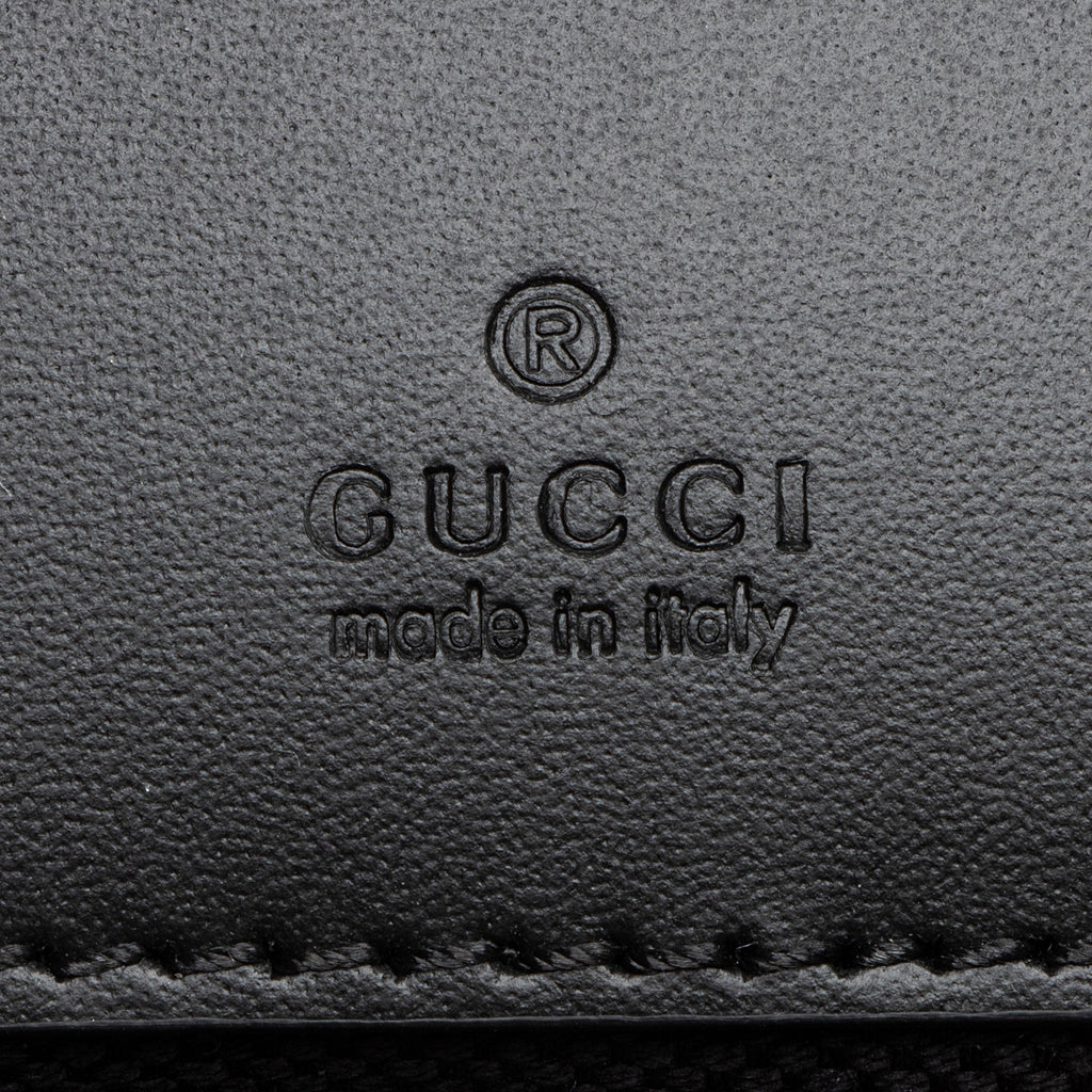 Gucci GG Debossed Leather Mini Shoulder Bag