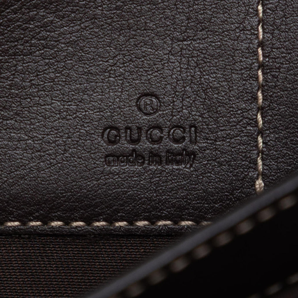 Gucci GG Supreme Clutch