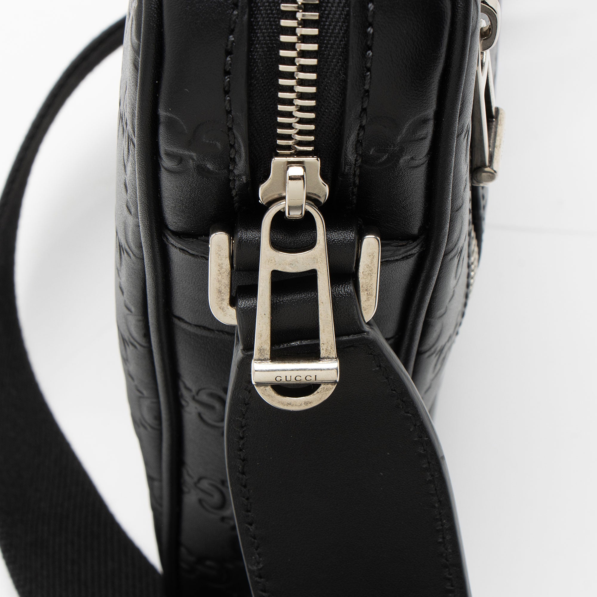 Gucci Guccissima Leather Emblem Small Crossbody