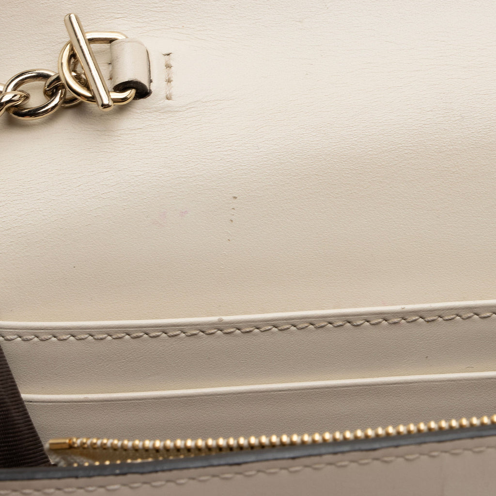 Gucci Guccissima Leather Signature Bow Mini Wallet on Chain