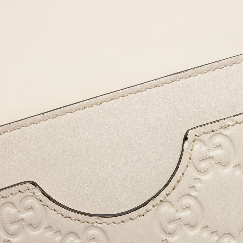 Gucci Guccissima Leather Signature Bow Mini Wallet on Chain