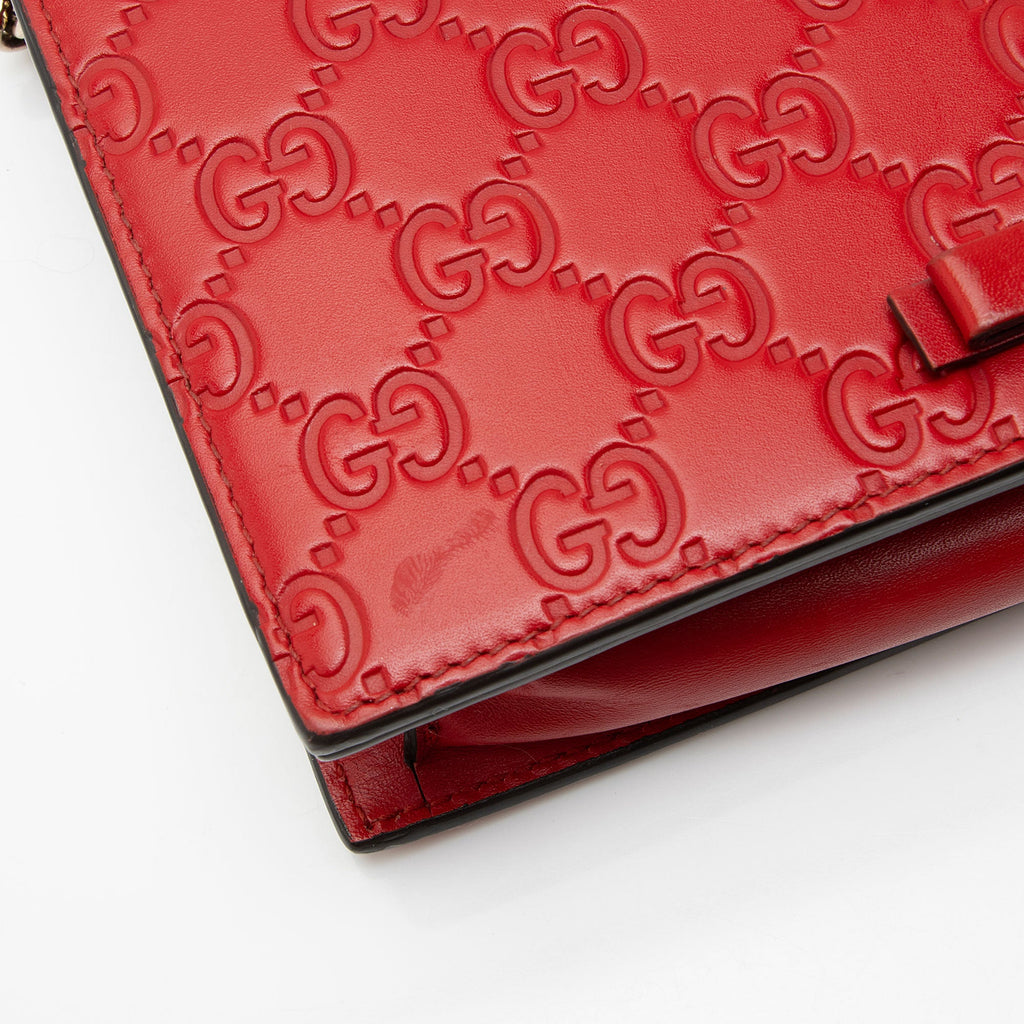 Gucci Guccissima Leather Signature Bow Mini Wallet on Chain