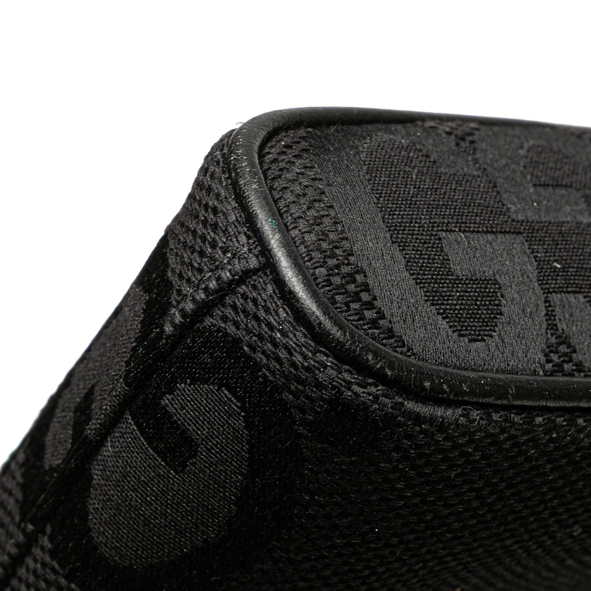 Gucci Jumbo GG Canvas Clutch on Strap