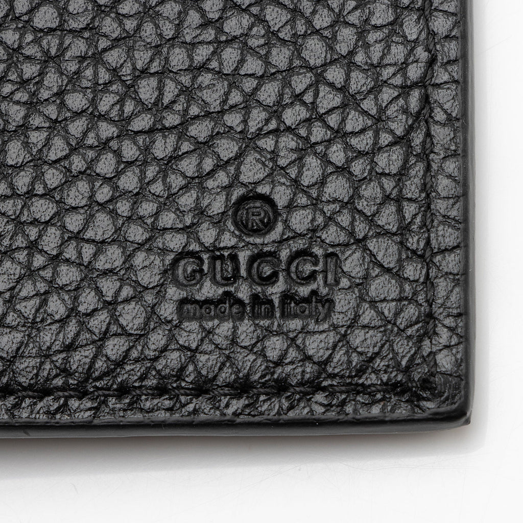 Gucci Jumbo GG Embossed Leather Bifold Wallet