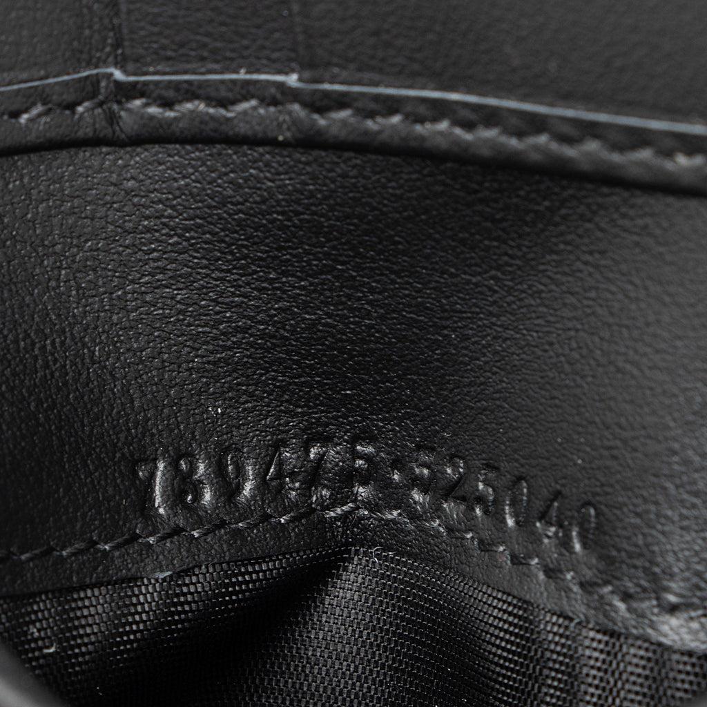 Gucci Jumbo GG Embossed Leather Bifold Wallet