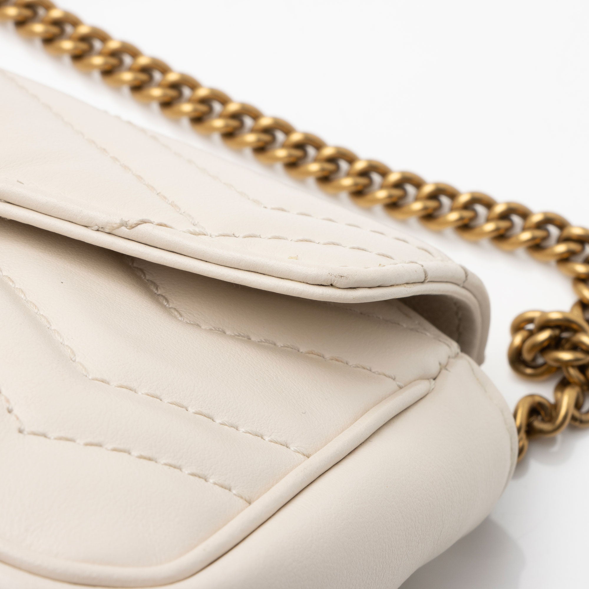 Gucci Matelasse Leather GG Marmont Super Mini Flap Bag (SHF-4vMIDn)