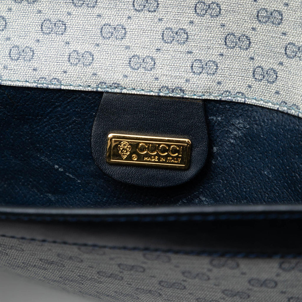 Gucci Micro GG Supreme Clutch