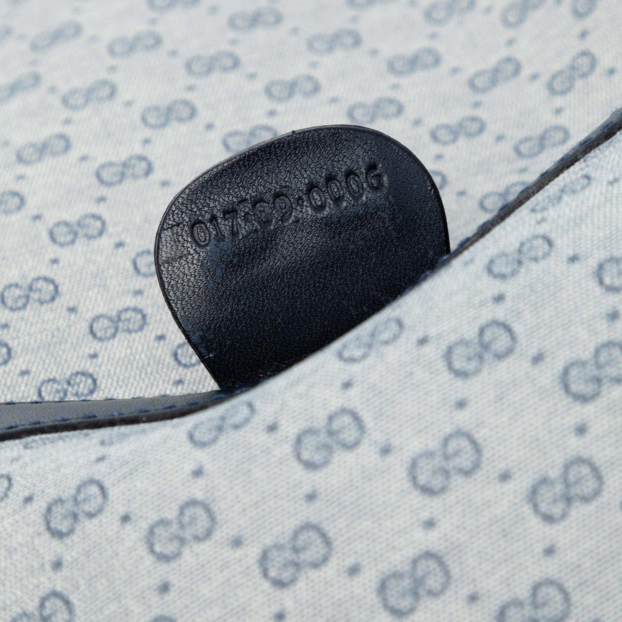 Gucci Micro GG Supreme Clutch