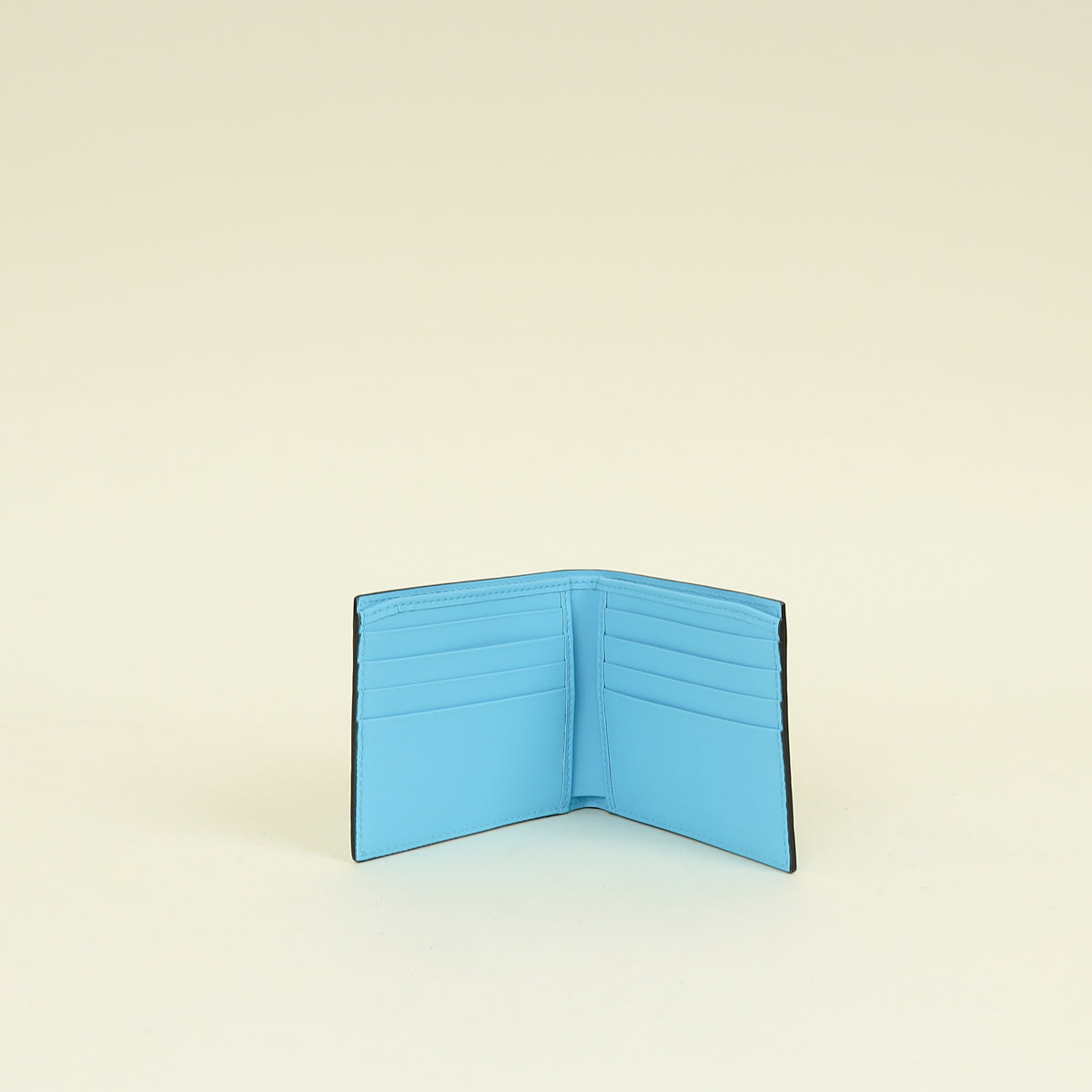 Gucci Neon Blue GG Embossed Rubberized Bi-Fold Wallet