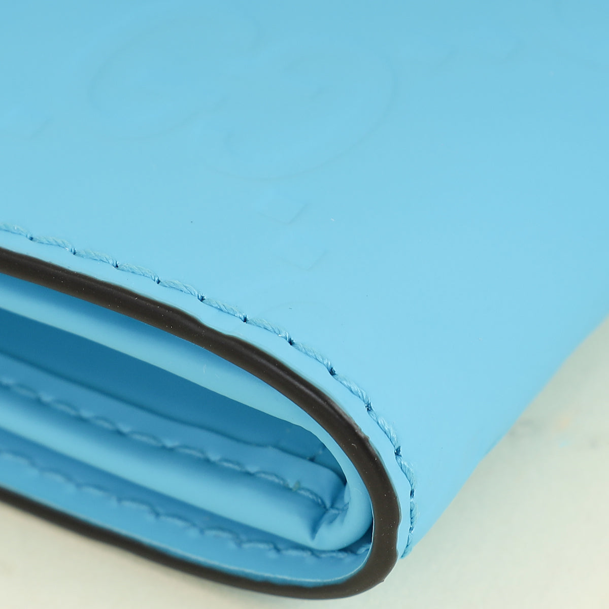 Gucci Neon Blue GG Embossed Rubberized Bi-Fold Wallet