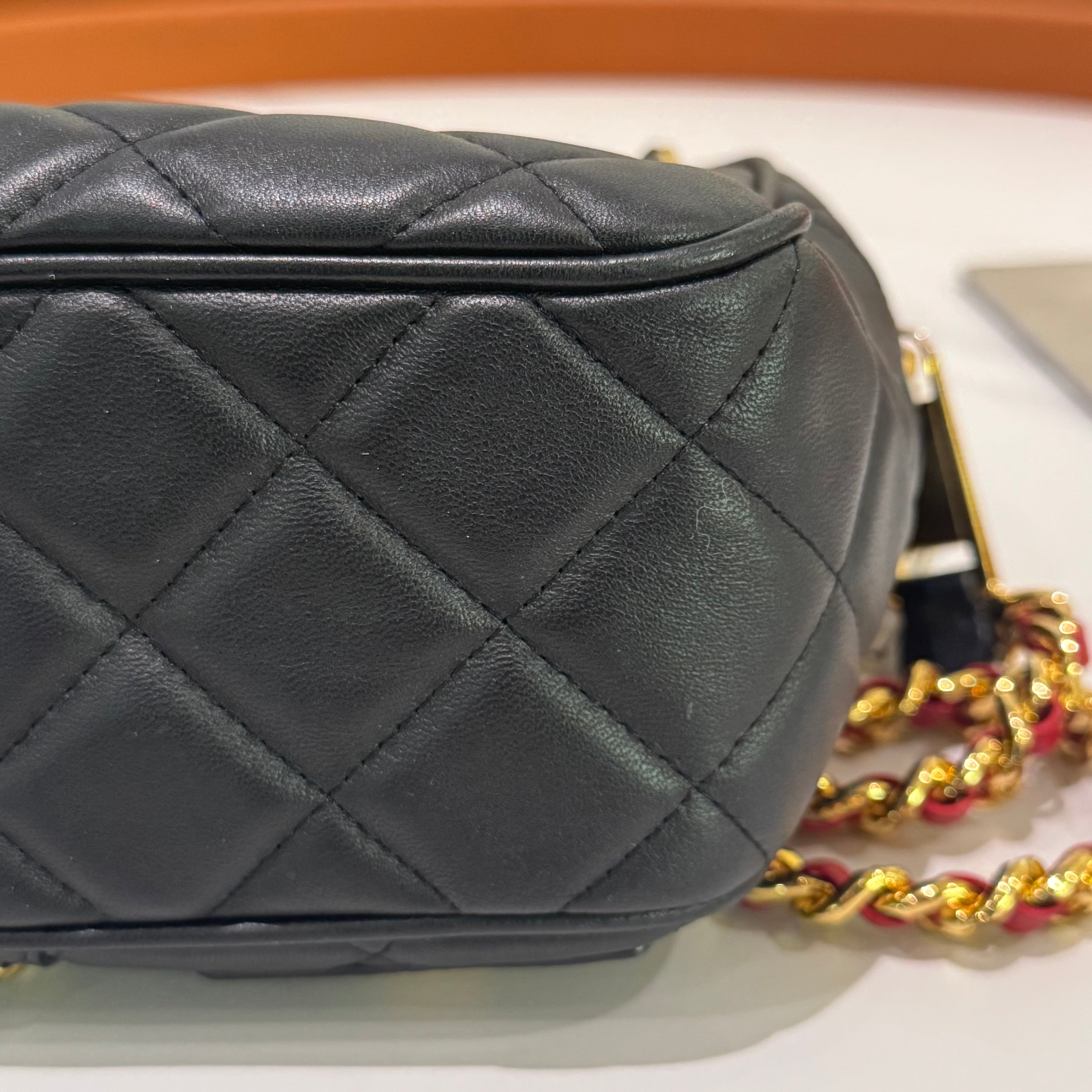MOSCHINO QUILTED CHAIN BAG WITH CLOTHING MOTIF