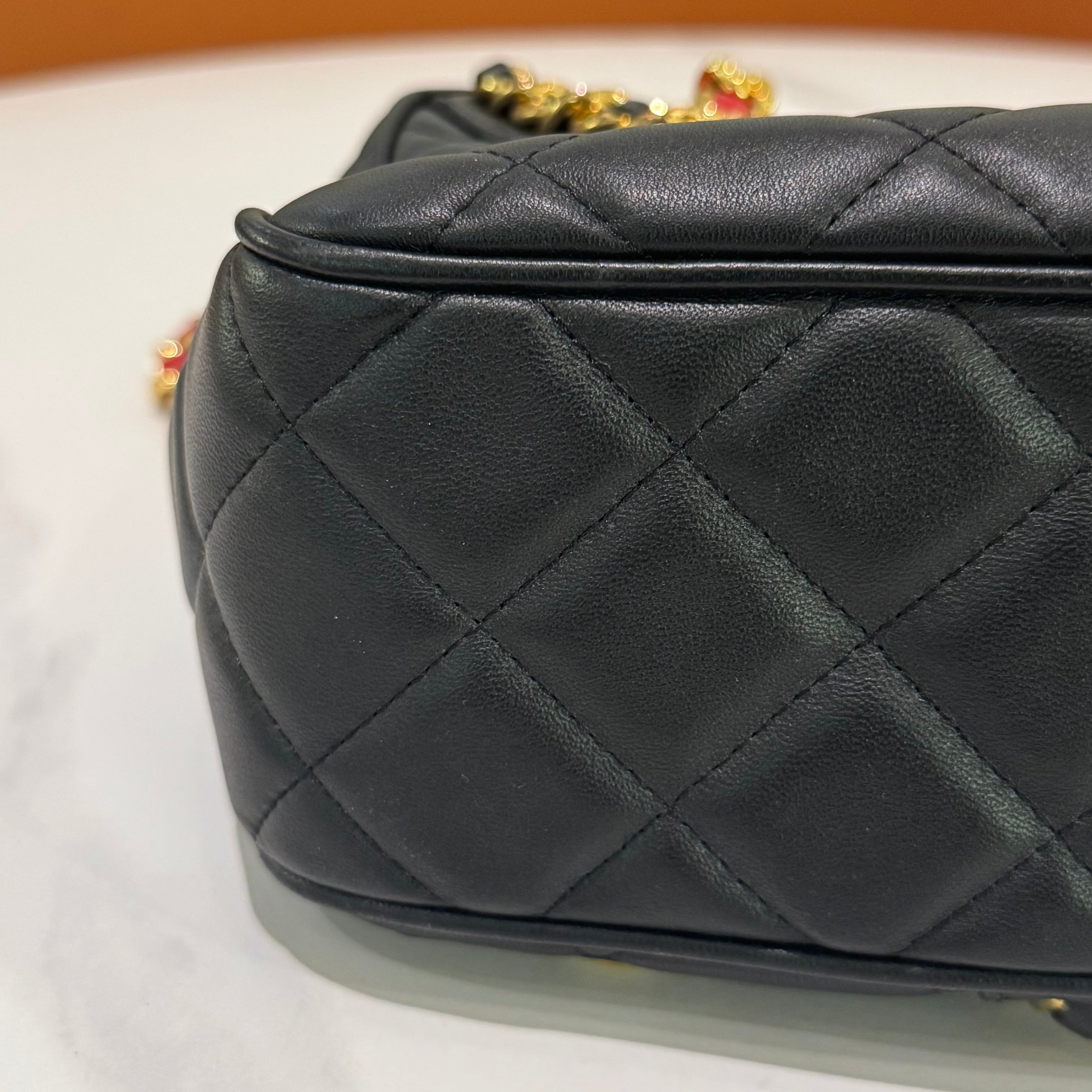 MOSCHINO QUILTED CHAIN BAG WITH CLOTHING MOTIF