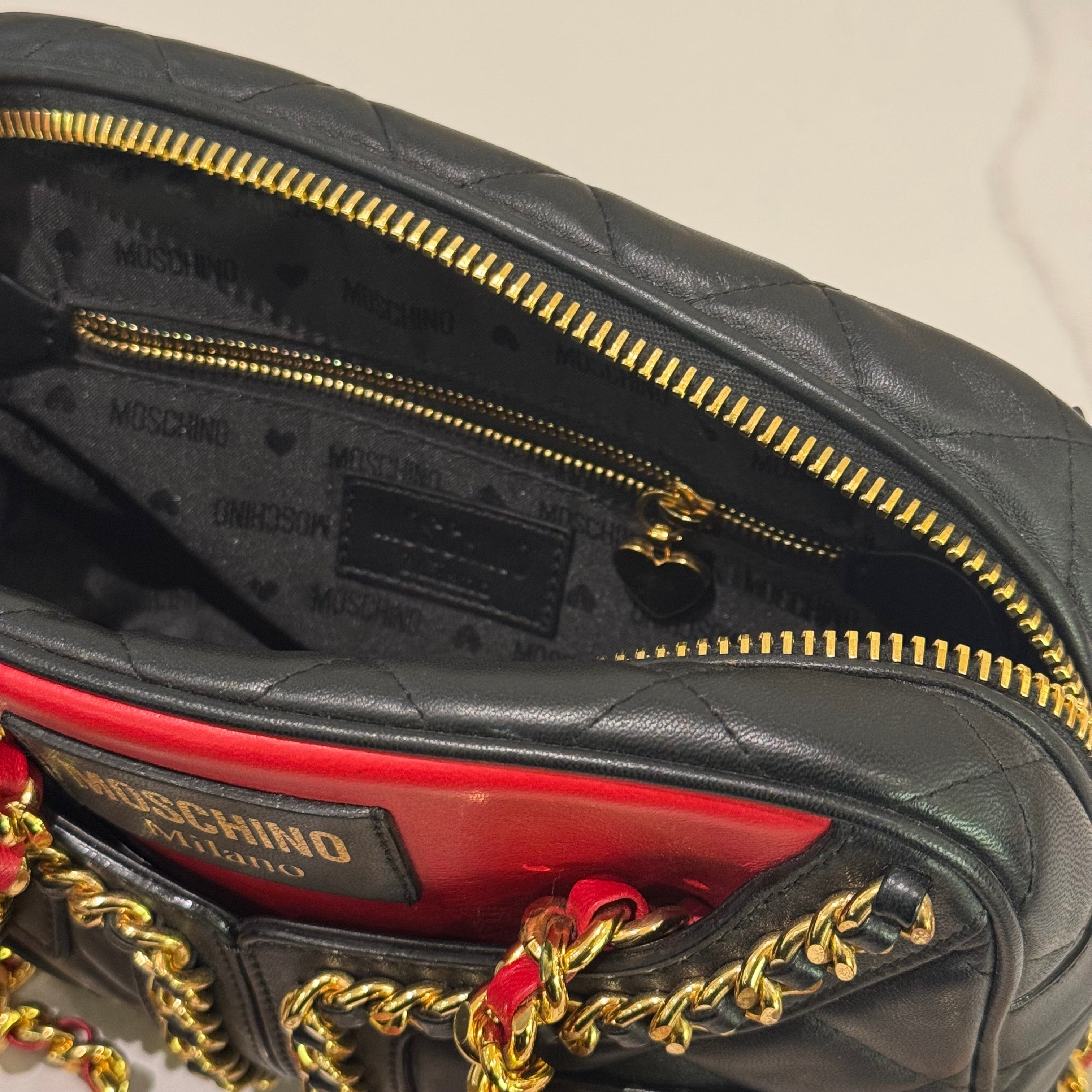 MOSCHINO QUILTED CHAIN BAG WITH CLOTHING MOTIF