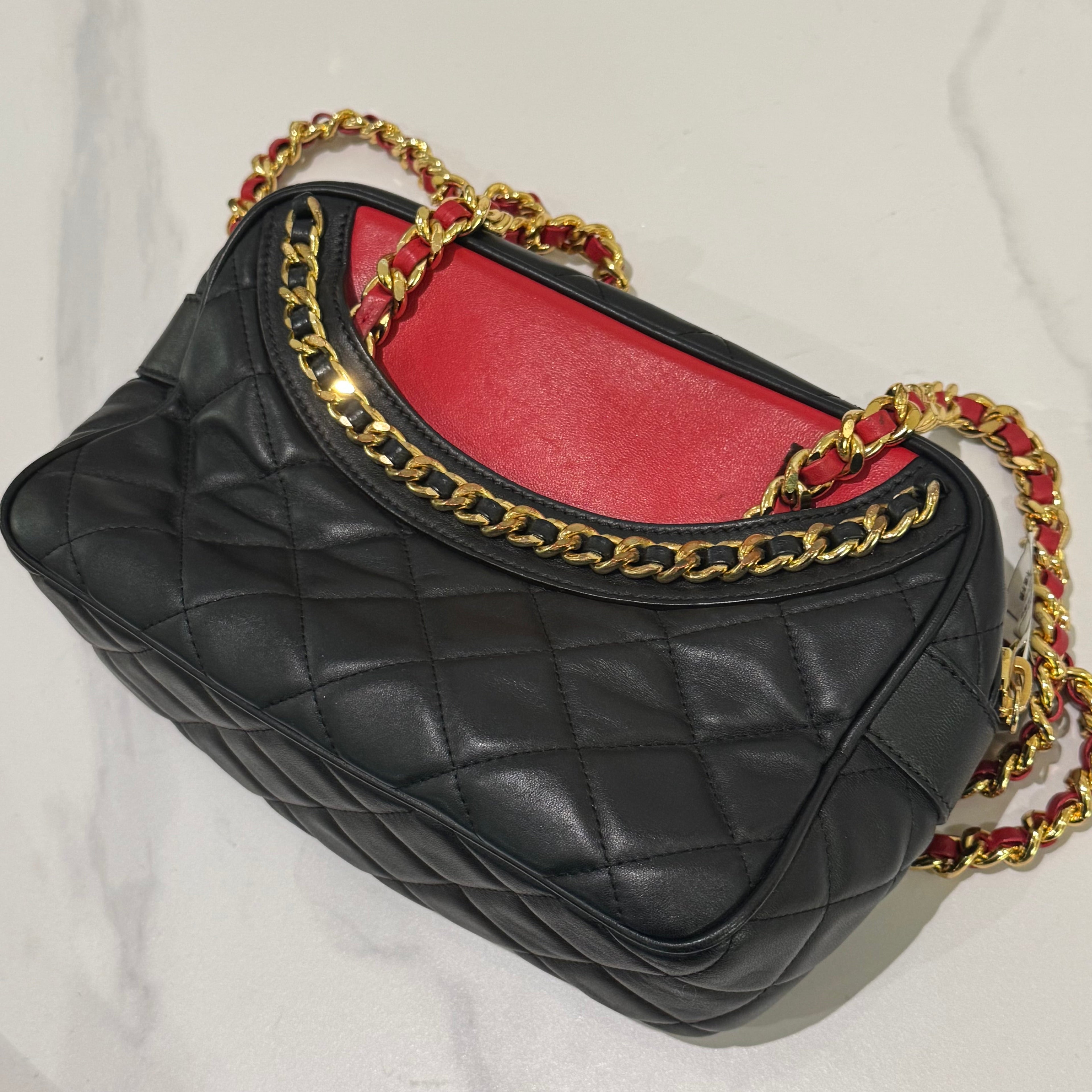 MOSCHINO QUILTED CHAIN BAG WITH CLOTHING MOTIF