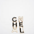 Chanel Cha-Nel Logo Drop Earrings Letter in Brass & Enamel – 2022 Collection