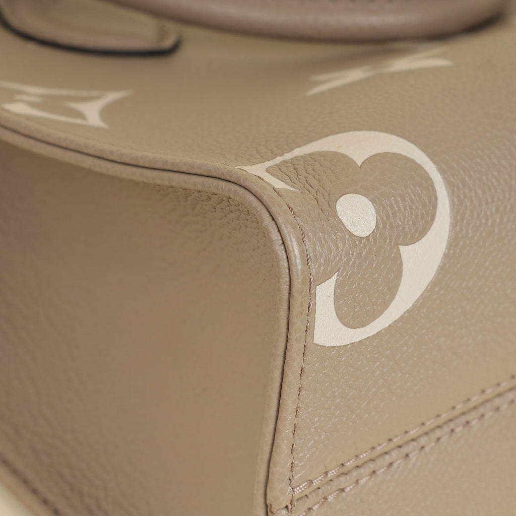 Louis Vuitton Bicolor Monogram Empreinte Onthego PM Bag