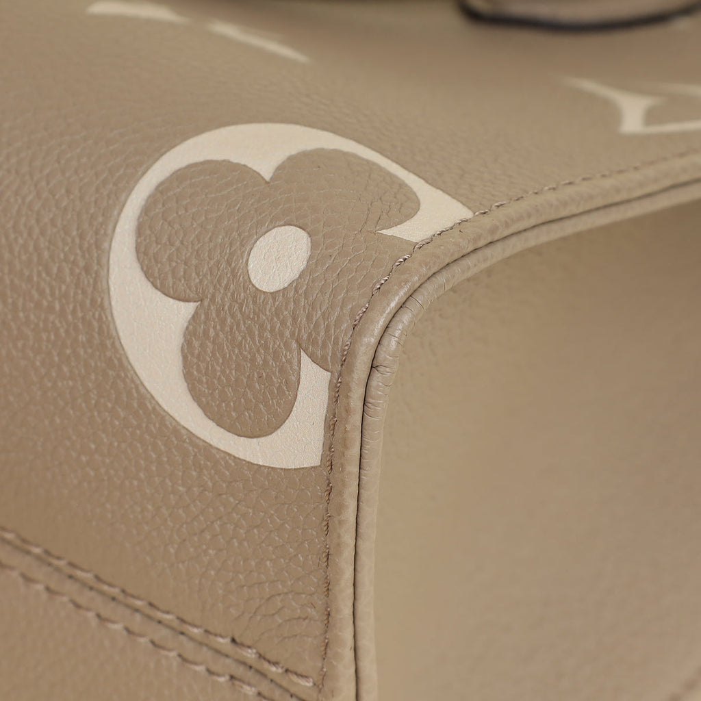 Louis Vuitton Bicolor Monogram Empreinte Onthego PM Bag