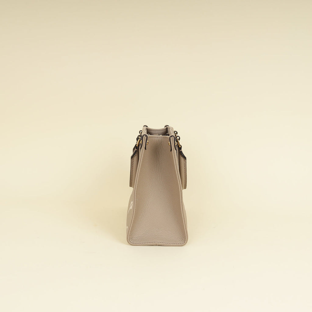 Louis Vuitton Bicolor Monogram Empreinte Onthego PM Bag