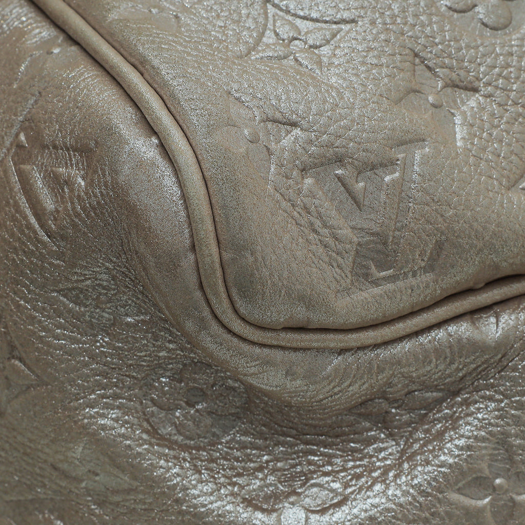Louis Vuitton Shimmer Peach Monogram Comete Bag