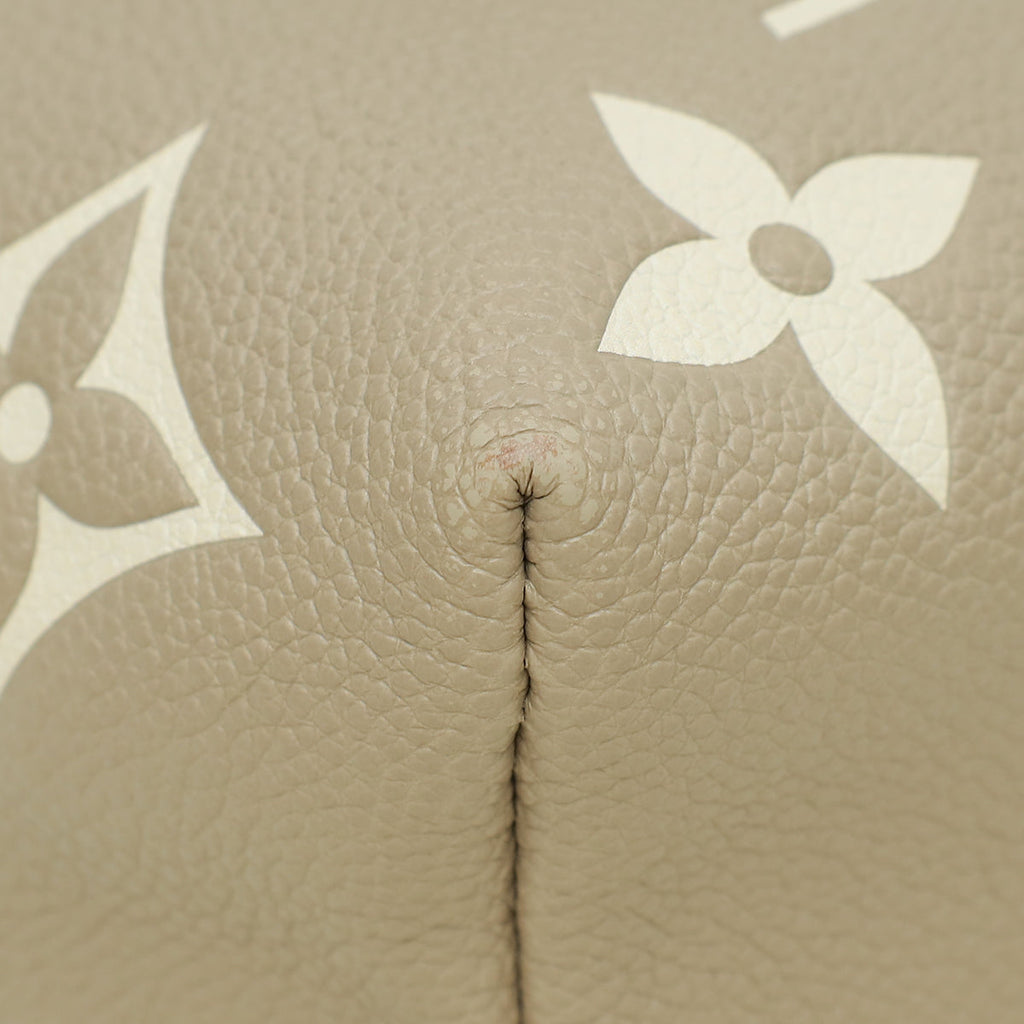 Louis Vuitton Bicolor Monogram Empreinte Embossed Tiny Backpack Bag