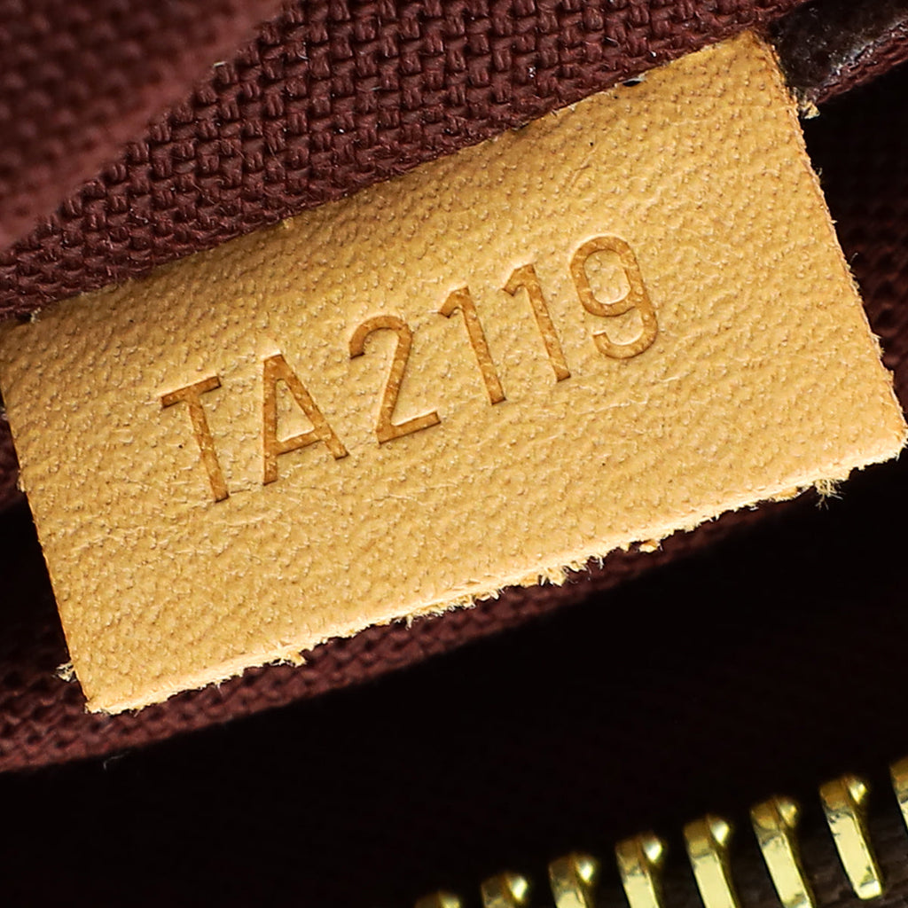 Louis Vuitton Monogram Rivoli MM Bag