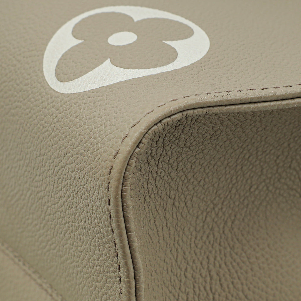 Louis Vuitton Bicolor Empreinte Monogram Giant OnTheGo MM Bag