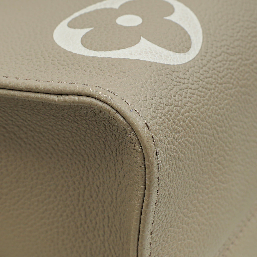 Louis Vuitton Bicolor Empreinte Monogram Giant OnTheGo MM Bag