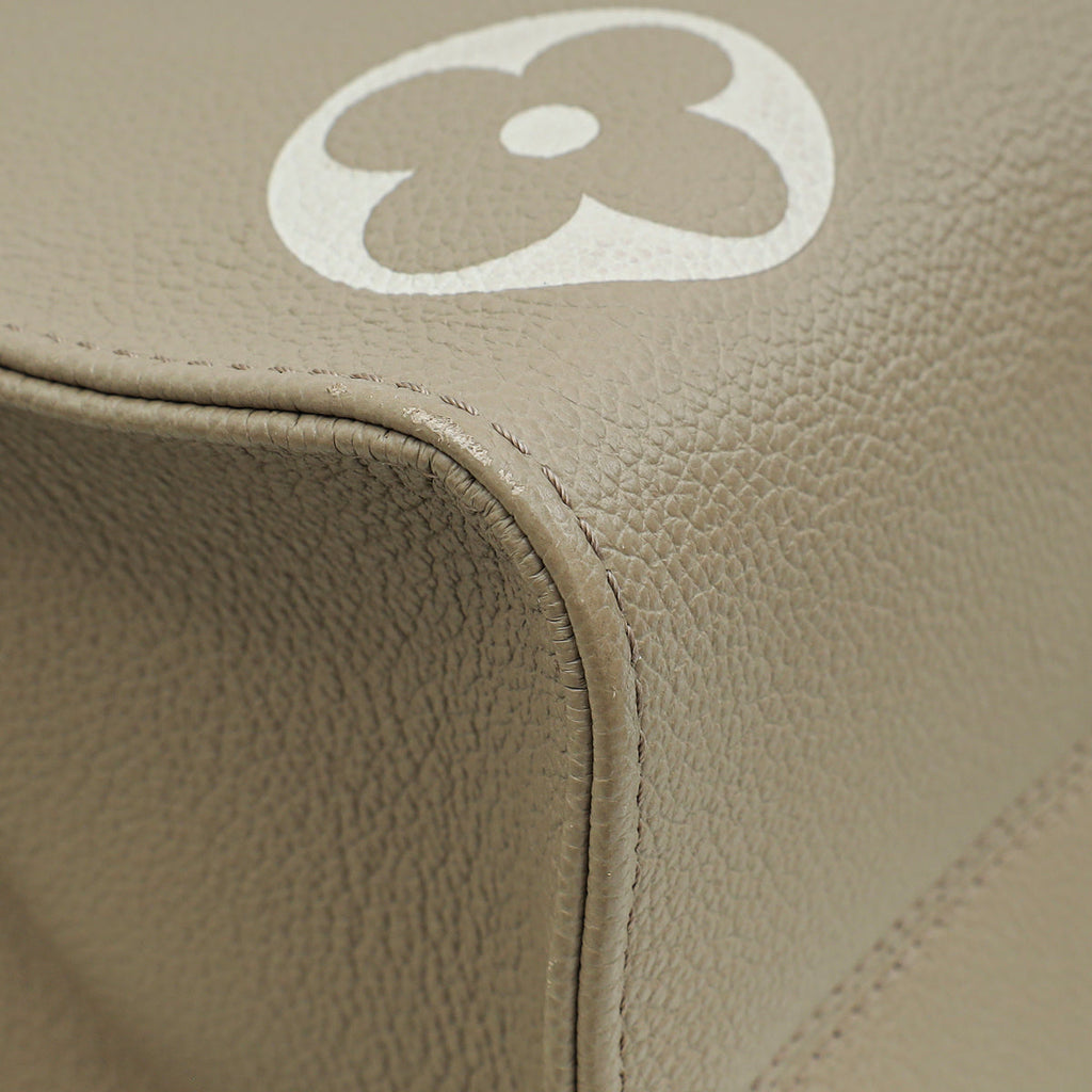 Louis Vuitton Bicolor Empreinte Monogram Giant OnTheGo MM Bag