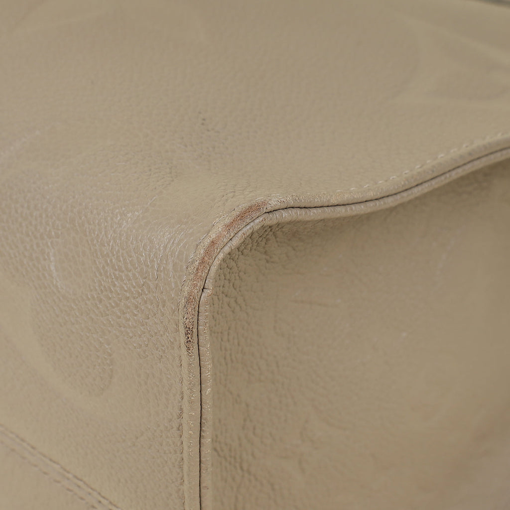 Louis Vuitton Tourterelle Beige Monogram Giant Empreinte Onthego MM Bag