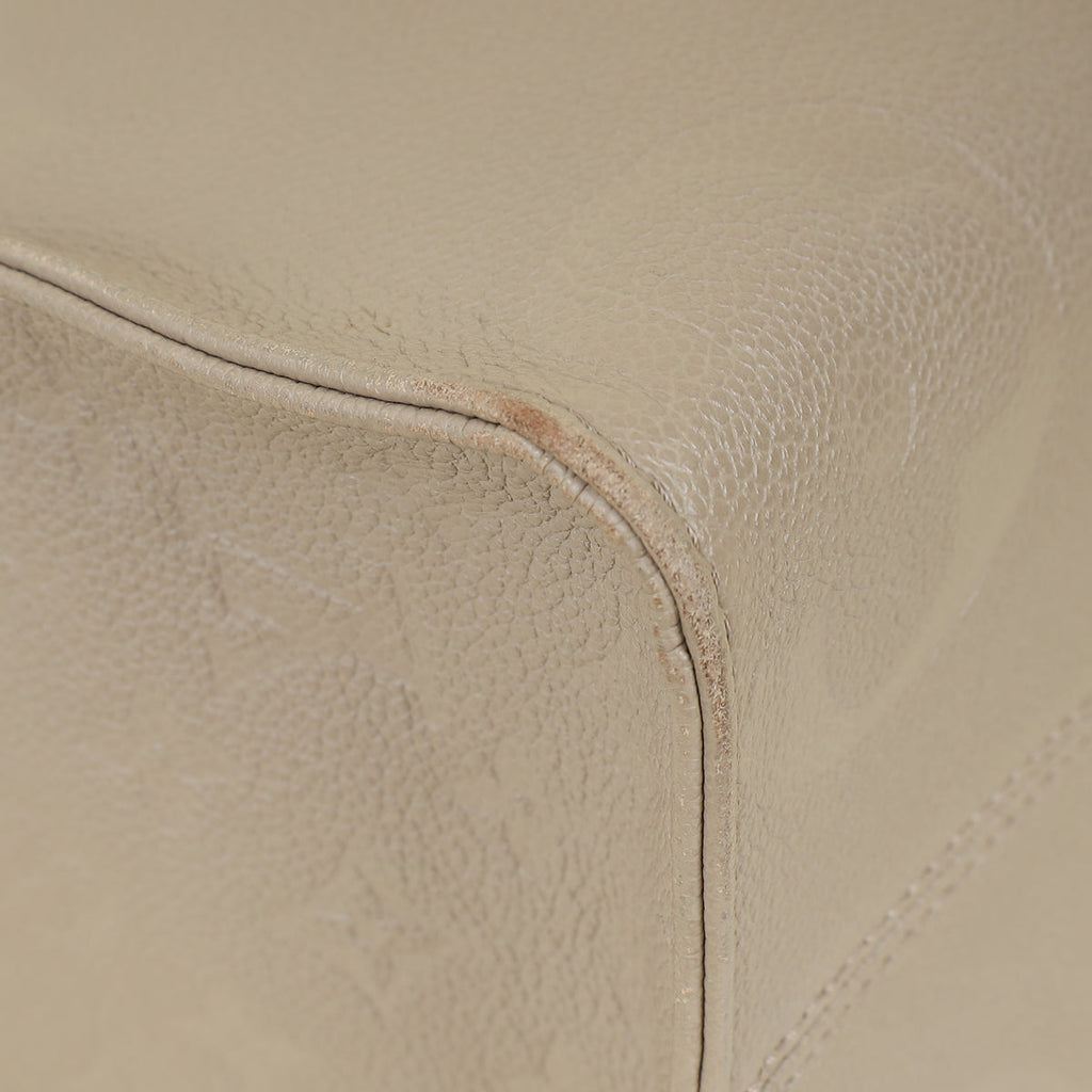 Louis Vuitton Tourterelle Beige Monogram Giant Empreinte Onthego MM Bag
