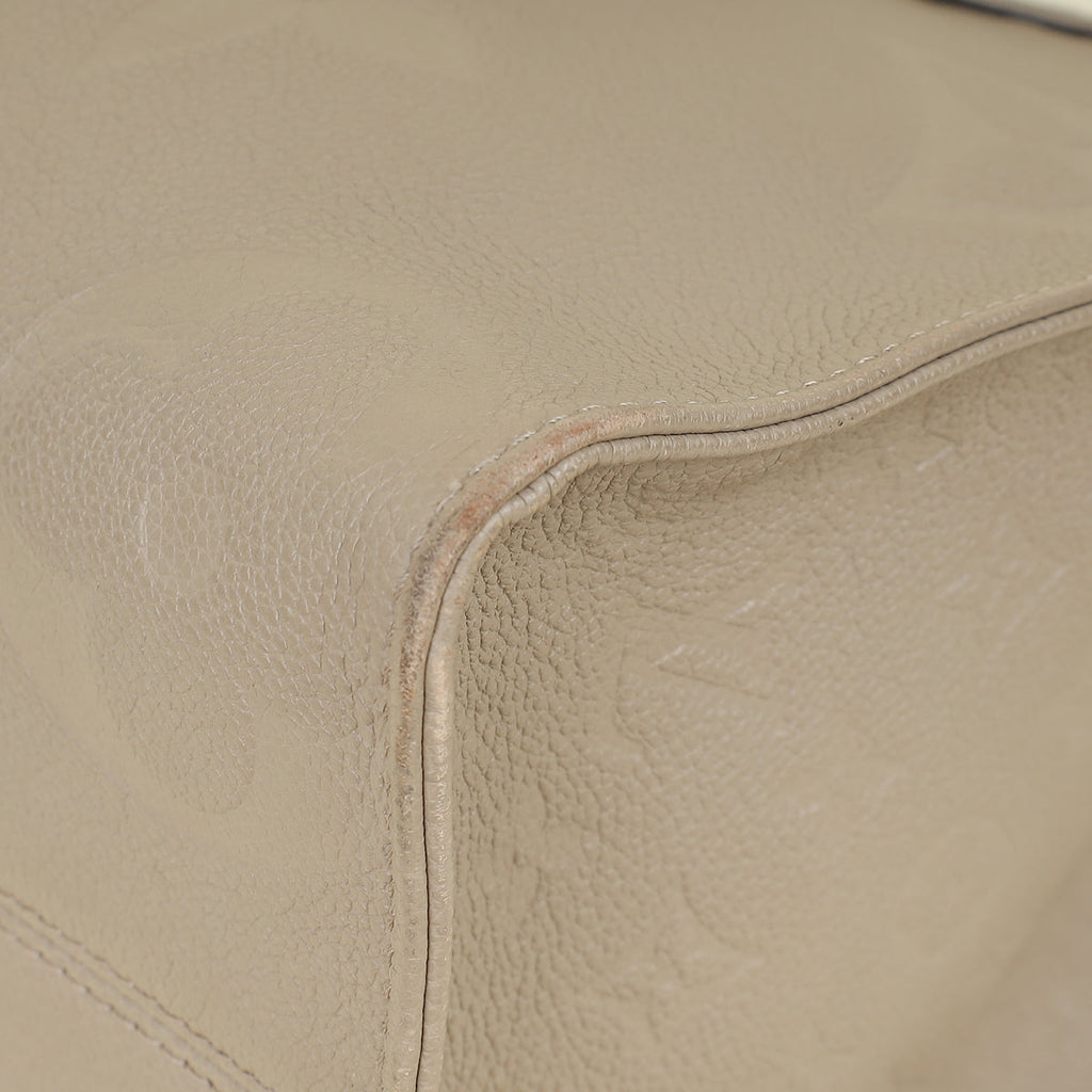 Louis Vuitton Tourterelle Beige Monogram Giant Empreinte Onthego MM Bag