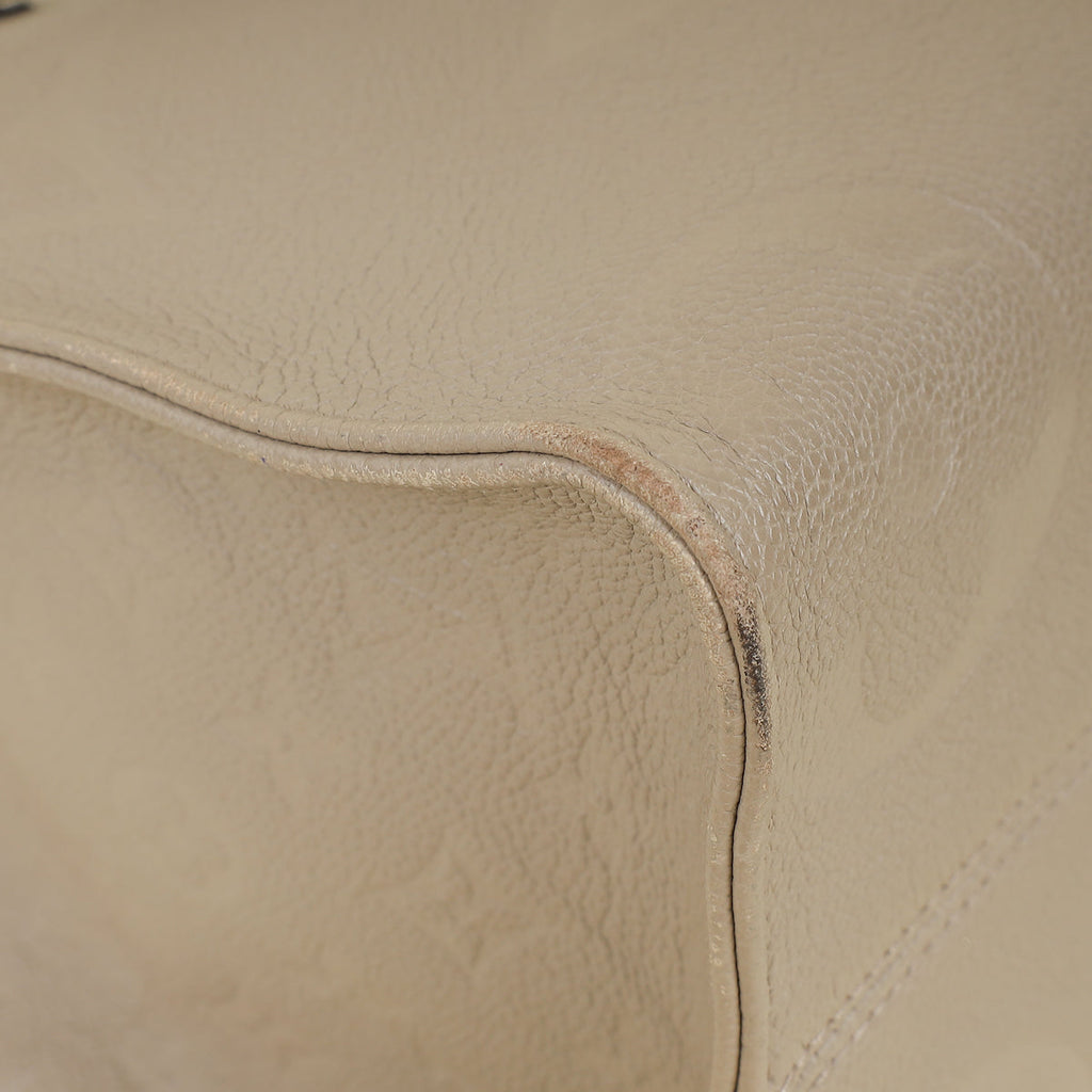 Louis Vuitton Tourterelle Beige Monogram Giant Empreinte Onthego MM Bag