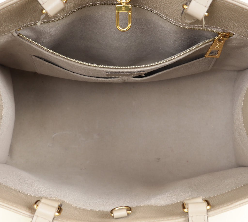 Louis Vuitton Tourterelle Beige Monogram Giant Empreinte Onthego MM Bag