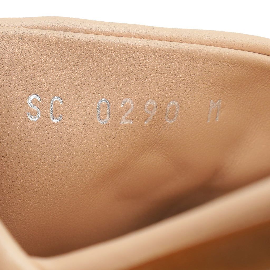 Louis Vuitton Nude Pink Monogram Embossed Revival Flat Mules 37
