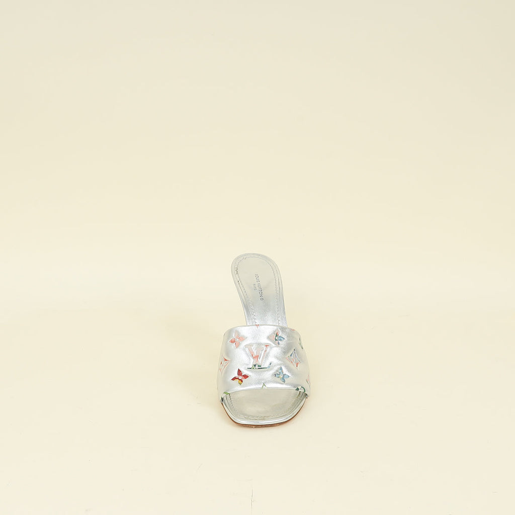 Louis Vuitton Metallic Silver Monogram Embossed Revival Mules 38