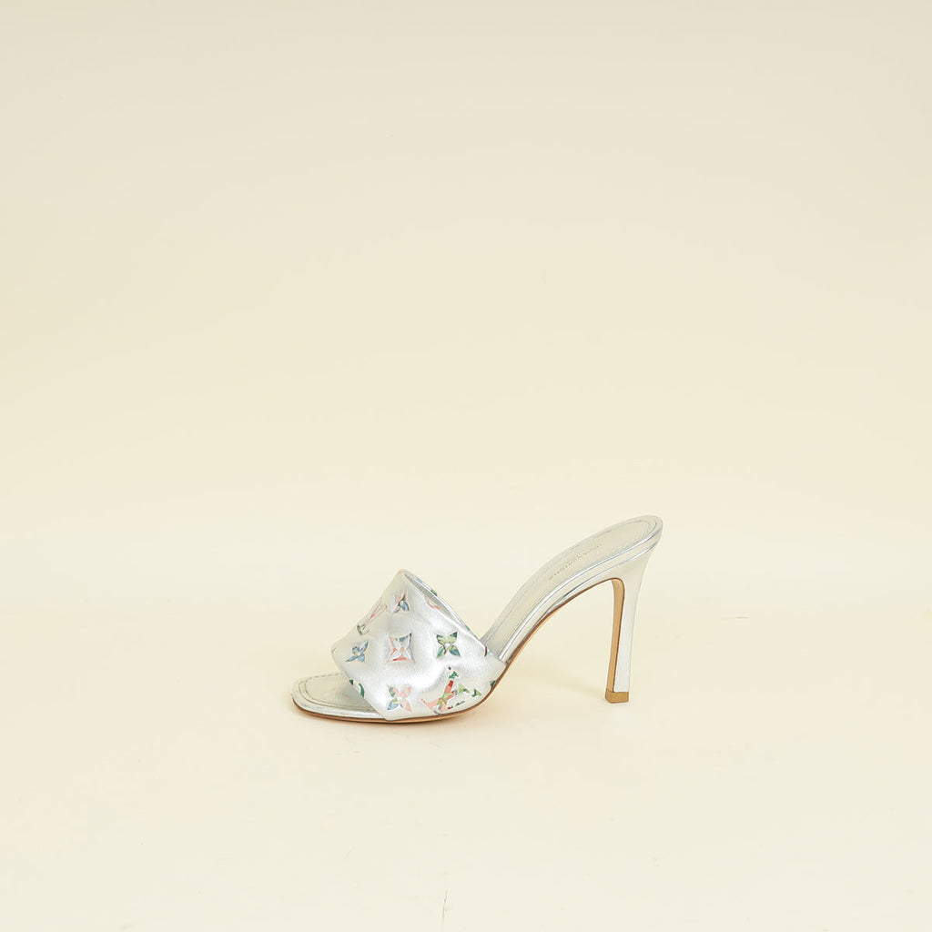 Louis Vuitton Metallic Silver Monogram Embossed Revival Mules 38
