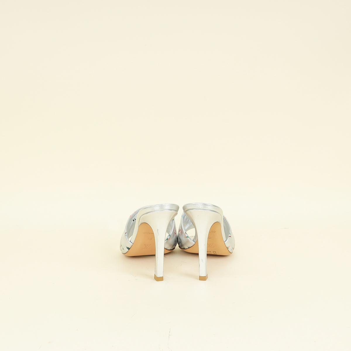 Louis Vuitton Metallic Silver Monogram Embossed Revival Mules 38
