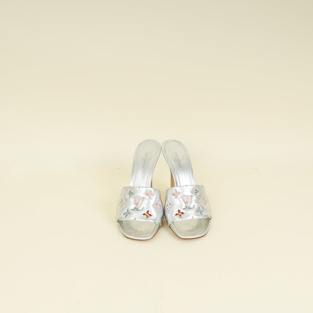 Louis Vuitton Metallic Silver Monogram Embossed Revival Mules 38