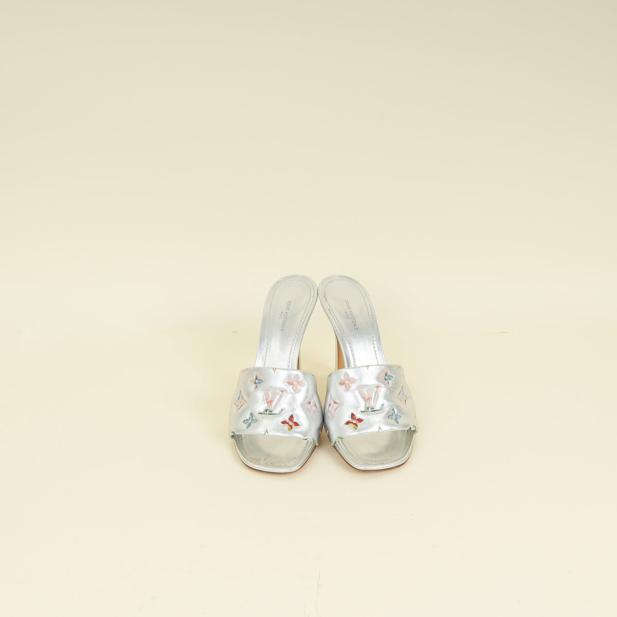 Louis Vuitton Metallic Silver Monogram Embossed Revival Mules 38