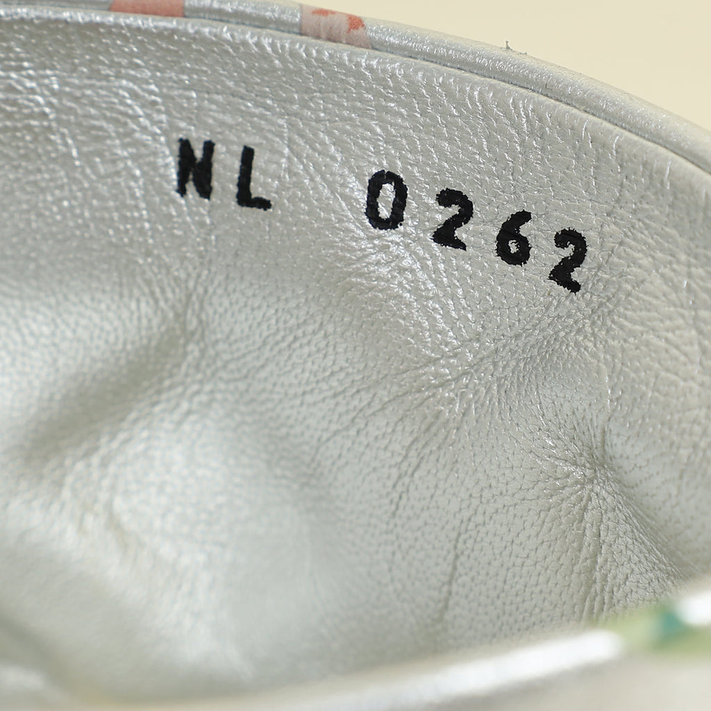 Louis Vuitton Metallic Silver Monogram Embossed Revival Mules 38