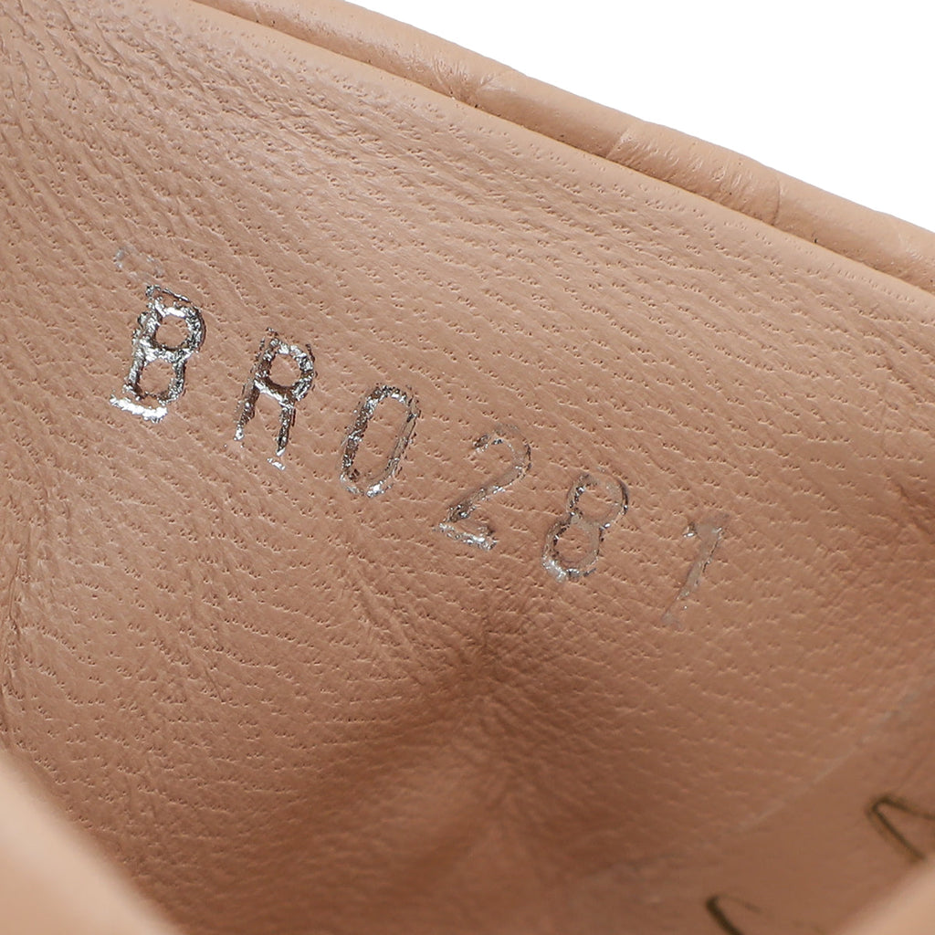 Louis Vuitton Nude Pink Monogram Embossed Revival Heeled Mules 39