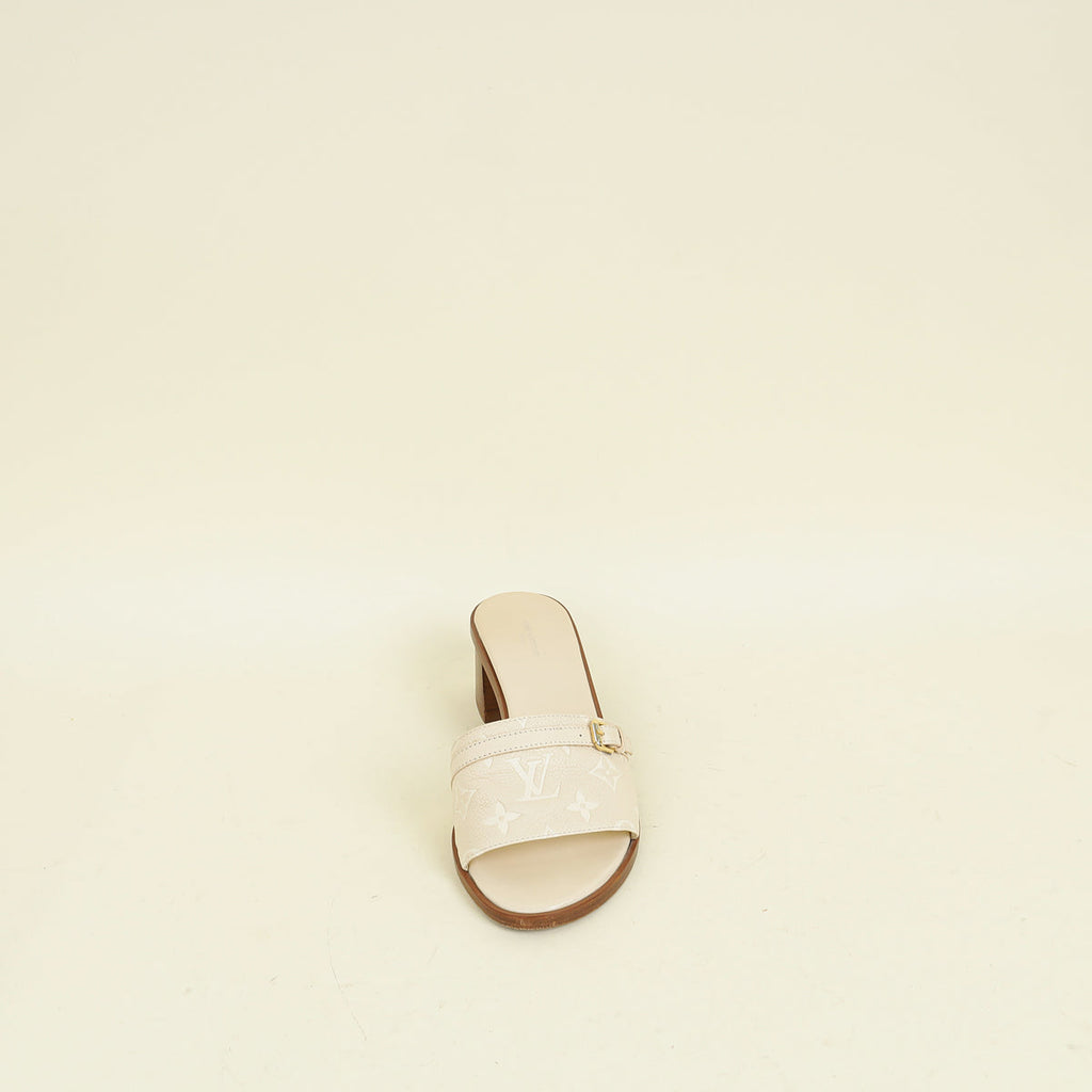 Louis Vuitton Cream Monogram Empreinte Lockit Mules 40