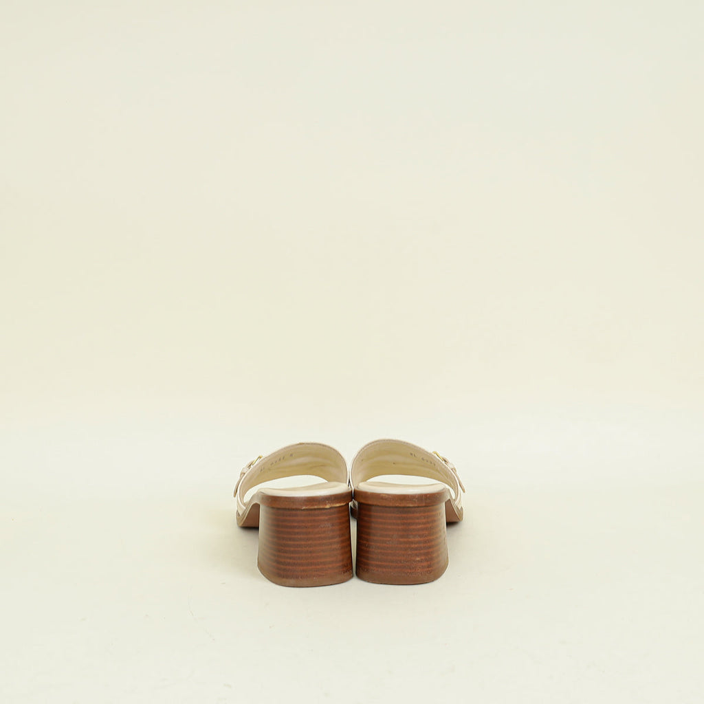Louis Vuitton Cream Monogram Empreinte Lockit Mules 40